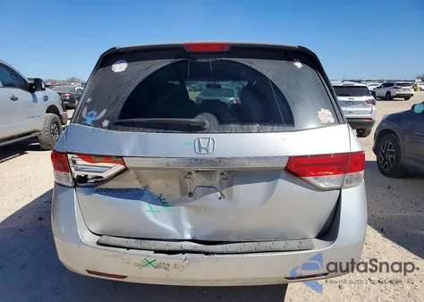 2014 Honda Odyssey Ex z USA, uszkodzony, nr VIN 5FNRL5H44EB001910